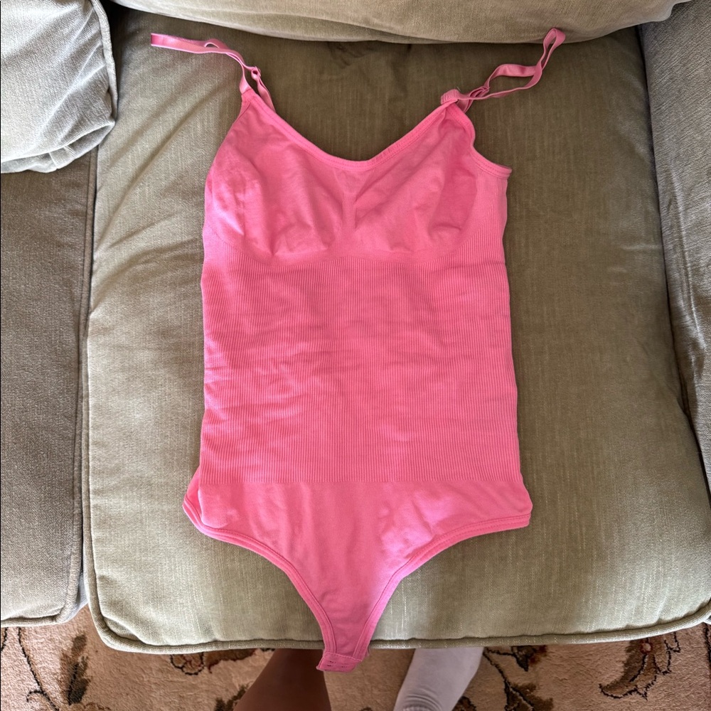 Pink bodysuit